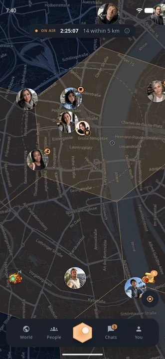 The map at night with the faces of people on air nearby and the on-air clock at the top.